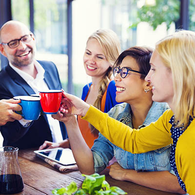 Oroox team coffee break — colleagues connecting over coffee.