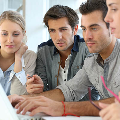 Oroox team collaboration — colleagues working seamlessly on projects together.