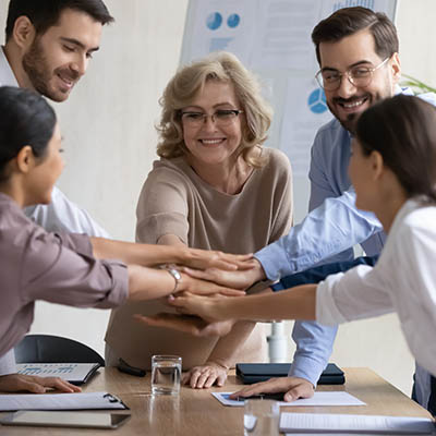 Oroox team working together — leveraging each member's strengths to drive project success.
